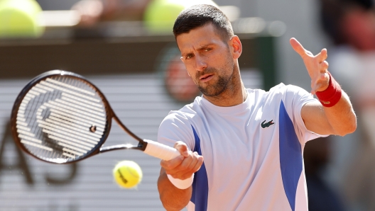 Serbia's Novak Djokovic returns the ball during a training session at the Roland Garros stadium, Saturday, May 25, 2024 in Paris. The French Open tennis tournament starts Sunday May 26, 2024. (AP Photo/Jean-Francois Badias)