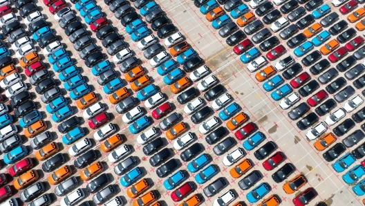 epa11217305  An aerial drone photo shows vehicles for export parking at Jiangyin terminal of Fuzhou Port in Fuzhou, southeast China, 12 March 2024. Four thousand vehicles produced by the passenger car workshop of Ningde base of SAIC Motor Corporation Ltd. on 12 March boarded the ro-ro cargo vessel "Wisdom Ace" at Jiangyin terminal of Fuzhou Port. This batch of vehicles will be sent to countries including the Netherlands, Egypt, and Britain. According to reports, this is the largest single load of export vehicles in Fujian Province, which include 2,800 new energy vehicles.  EPA/XINHUA / Lin Shanchuan CHINA OUT / UK AND IRELAND OUT  /       MANDATORY CREDIT  EDITORIAL USE ONLY  EDITORIAL USE ONLY