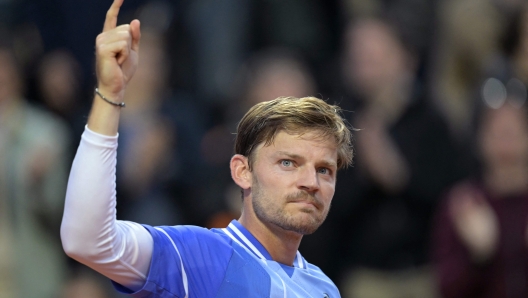 Belgium's David Goffin celebrates after winning his men's singles match against France's Giovanni Mpetshi Perricard on day three of the French Open tennis tournament at the Roland Garros Complex in Paris on May 28, 2024. (Photo by Bertrand GUAY / AFP)