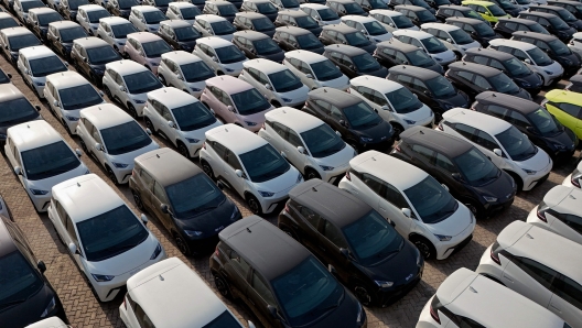 This photo taken on April 18, 2024 shows BYD electric cars for export waiting to be loaded onto a ship at a port in Yantai, in eastern China's Shandong province. (Photo by AFP) / China OUT