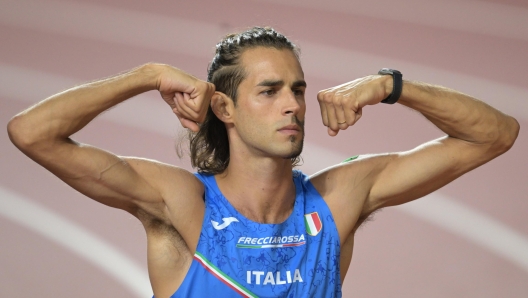 epa10814423 Gianmarco Tamberi of Italy celebrates after winning the gold medal in the High Jump Men final competition of the World Athletics Championships in Budapest, Hungary, 22 August 2023.  EPA/Tibor Illyes HUNGARY OUT