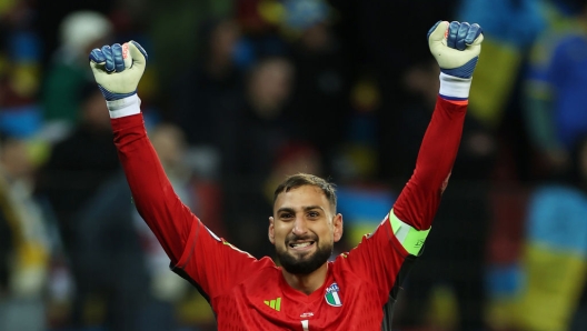 LEVERKUSEN, GERMANY - NOVEMBER 20: Gianluigi Donnarumma of Italy celebrates after the UEFA EURO 2024 European qualifier match between Ukraine and Italy at BayArena on November 20, 2023 in Leverkusen, Germany. (Photo by Lars Baron/Getty Images)