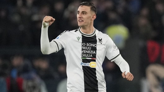 Udinese's Lorenzo Lucca celebrates after scoring his side's first goal during a Serie A soccer match between Lazio and Udinese, at Rome's Olympic Stadium, Monday, March 11, 2024. (AP Photo/Andrew Medichini)