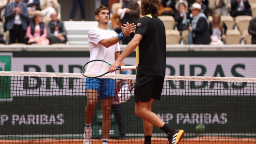 PARIS, FRANCE - JUNE 02: Stefanos Tsitsipas of Greece celebrates his victory against Matteo Arnaldi of Italy in the Men's Singles fourth round match during Day Eight of the 2024 French Open at Roland Garros on June 02, 2024 in Paris, France. (Photo by Clive Brunskill/Getty Images)