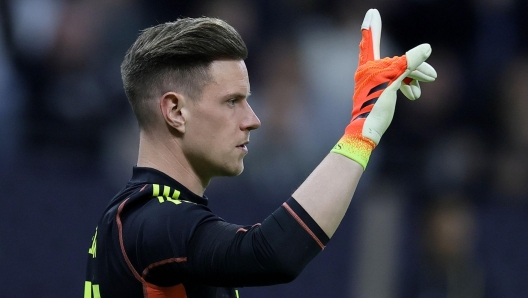 epa11245658 Germany's goalkeeper Marc-Andre ter Stegen gestures during the friendly international soccer match between Germany and the Netherlands in Frankfurt am Main, Germany, 26 March 2024.  EPA/RONALD WITTEK