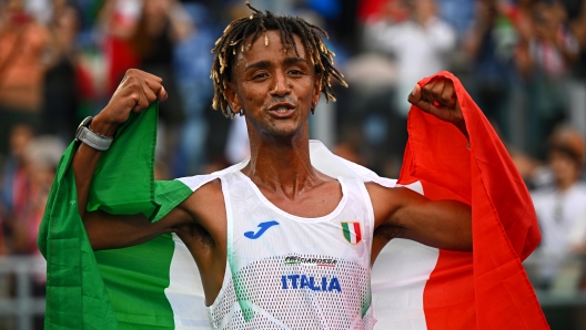 ROME, ITALY - JUNE 09: Gold medalist, Yemaneberhan Crippa of Team Italy, celebrates winning the Men's Half Marathon Final on day three of the 26th European Athletics Championships - Rome 2024 at Stadio Olimpico on June 09, 2024 in Rome, Italy. (Photo by Mattia Ozbot/Getty Images for European Athletics)