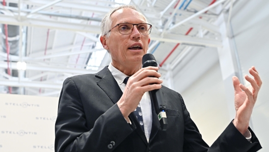 Stellantis CEO Carlos Tavares delivers a speech on the occasion of the inauguration of the new production department for electrified eDct transmissions within the Mirafiori Automotive Park 2030 which also includes the battery technology center, the circular economy hub and the Green Campus, in Turin, Italy, 10 April 2024. ANSA/ALESSANDRO DI MARCO