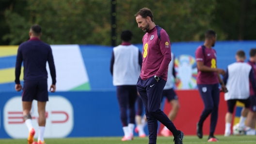 England's head coach Gareth Southgate looks on during a training session of England's national football team, ahead of the UEFA Euro 2024 European football Championship, in Blankenhain, Thuringia, on June 13, 2024. (Photo by Adrian DENNIS / AFP)