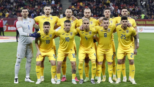 epa11393034 (FILE) - Romanian starting eleven players pose for the team photo before the friendly international soccer match between Romania and Northern Ireland in Bucharest, Romania, 22 March 2024 (re-issued 06 June 2024). Romania will play in Group E at the UEFA EURO 2024 with Slovakia, Belgium, Ukraine. Top from L: Florin Constantin Nita, Radu Dragusin, Vasile Mogos, George Puscas, Dennis Man and Andrei Burca. Front from L: Razvan Marin, Nicolae Claudiu Stanciu, Cristian Marian Manea, Alexandru Cicaldau and Florinel Coman.  EPA/Robert Ghement