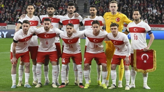 epa11393032 (FILE) - Players of Turkey pose for the starting eleven group photo prior the friendly soccer match between Hungary and Turkey in Budapest, Hungary, 22 March 2024 (re-issued 06 June 2024). Turkey will play in Group F at the UEFA EURO 2024 with Czech Republic, Georgia and Portugal. Top from L: Enes Uenal, Ozan Kabak, Samet Akaydin, Zeki Celik, Mert Guenok and Calhanoglu. Front from L: Ismail Yueksek, Orkum Koekcue, Yunus Akguen, Kenan Yildiz and Ridvan Yilmaz  EPA/Szilard Koszticsak HUNGARY OUT