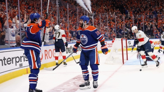 EDMONTON, ALBERTA - JUNE 15: Adam Henrique #19 of the Edmonton Oilers celebrates his first period goal in Game Four of the 2024 Stanley Cup Final at Rogers Place on June 15, 2024 in Edmonton, Alberta.   Bruce Bennett/Getty Images/AFP (Photo by BRUCE BENNETT / GETTY IMAGES NORTH AMERICA / Getty Images via AFP)