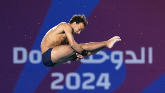 Andreas Sargent Larsen of Italy competes during the men's 10m platform diving preliminary at the World Aquatics Championships in Doha, Qatar, Friday, Feb. 9, 2024. (AP Photo/Hassan Ammar)