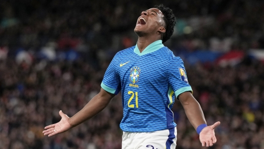 FILE -  Brazil's Endrick celebrates after scoring the opening goal during a friendly soccer match between England and Brazil at Wembley Stadium in London, Saturday, March 23, 2024. The 17-year-old striker is widely expected to be in the starting lineup at Copa America, his first major event with the senior team. (AP Photo/Alastair Grant, File)