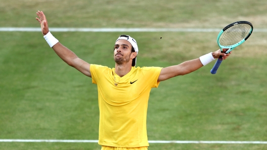 LONDON, ENGLAND - JUNE 20: Lorenzo Musetti of Italy celebrates winning match point against Brandon Nakashima of United States following the Men's Singles Round of 16 match on Day Four of the cinch Championships at The Queen's Club on June 20, 2024 in London, England. (Photo by James Fearn/Getty Images)