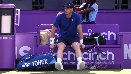 LONDON, ENGLAND - JUNE 19: Andy Murray of Great Britain looks on during a changeover against Jordan Thompson of Australia during the Men's Singles of 16 match on Day Three of the cinch Championships at The Queen's Club on June 19, 2024 in London, England.  (Photo by Luke Walker/Getty Images for LTA)