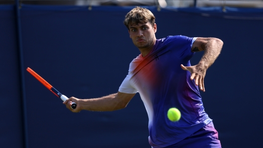 EASTBOURNE, ENGLAND - JUNE 26: Flavio Cobolli of Italy plays a forehand against Giles Hussey of Great Britain during the Men's Singles Round of 16 match on Day Five of the Rothesay International Eastbourne at Devonshire Park on June 26, 2024 in Eastbourne, England.  (Photo by Charlie Crowhurst/Getty Images for LTA)