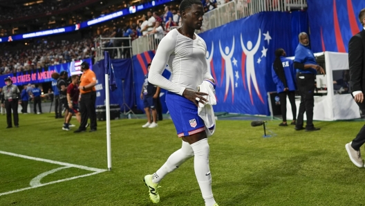 Tim Weah of the United States leaves the field after receiving a red card during a Copa America Group C soccer match against Panama in Atlanta, Thursday, June 27, 2024. (AP Photo/Mike Stewart)