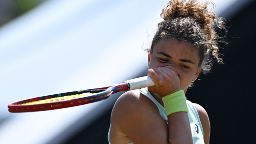 Italy's Jasmine Paolini reacts after losing a point against Russia's Daria Kasatkina during their women's singles semi-final tennis match at the Rothesay Eastbourne International tennis tournament in Eastbourne, southern England, on June 28, 2024. Kasatkina won 3-6, 7-5, 6-3. (Photo by Glyn KIRK / AFP)