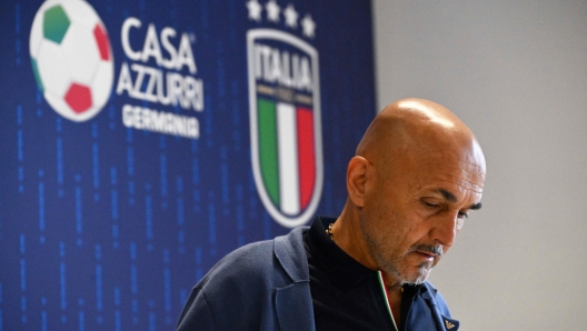 Italy's head coach Luciano Spalletti attends a press conference at the team's base camp in Iserlohn, on June 30, 2024, after they were eliminated by Switzerland in a round of 16 match of the UEFA Euro 2024 football championship. (Photo by Alberto PIZZOLI / AFP)