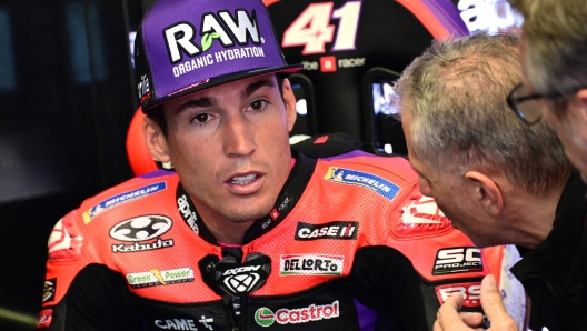 Aprilia Racing's Spanish rider Aleix Espargaro looks on during a practice session ahead of the Italian MotoGP race at Mugello on May 31, 2024. (Photo by Marco BERTORELLO / AFP)