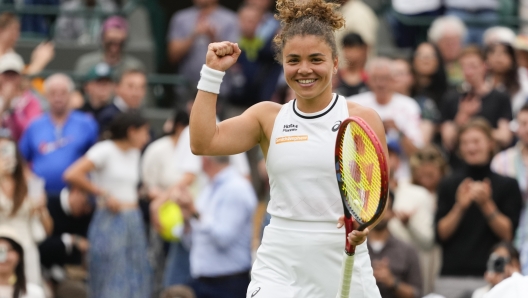 Jasmine Paolini of Italy reacts after defeating Bianca Andreescu of Canada in their third round match at the Wimbledon tennis championships in London, Friday, July 5, 2024. (AP Photo/Kirsty Wigglesworth)