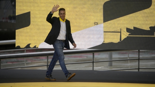 Five-time Tour de France winner Miguel Indurain from Spain attends the team presentation ahead of the Tour de France cycling race in Bilbao, Spain, Thursday, June 29, 2023. The race starts on Saturday, July 1, with the first stage over 182 kilometers (113 miles) with start and finish in Bilbao. (AP Photo/Daniel Cole)