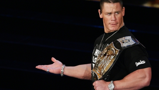 US wrestling champion John Cena appears on the stage of the Ariston Theatre in San Remo during the 56th Italian music festival, 02 March 2006. AFP PHOTO/Tiziana Fabi