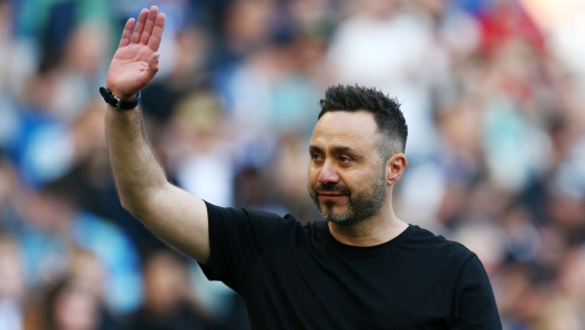 BRIGHTON, ENGLAND - MAY 19: Roberto De Zerbi, Manager of Brighton & Hove Albion, acknowledges the fans following the Premier League match between Brighton & Hove Albion and Manchester United at American Express Community Stadium on May 19, 2024 in Brighton, England. (Photo by Charlie Crowhurst/Getty Images)