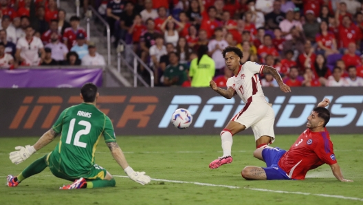 ORLANDO, FLORIDA - JUNE 29: Tajon Buchanan of Canada kicks the ball during the CONMEBOL Copa America 2024 Group A match between Canada and Chile at Exploria Stadium on June 29, 2024 in Orlando, Florida.   Leonardo Fernandez/Getty Images/AFP (Photo by Leonardo Fernandez / GETTY IMAGES NORTH AMERICA / Getty Images via AFP)