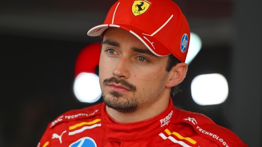 SPIELBERG, AUSTRIA - JUNE 30: 11th placed Charles Leclerc of Monaco and Ferrari talks to the media in the Paddock after the F1 Grand Prix of Austria at Red Bull Ring on June 30, 2024 in Spielberg, Austria. (Photo by Rudy Carezzevoli/Getty Images)