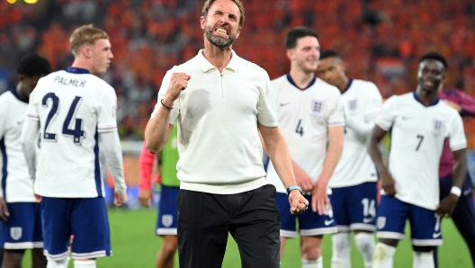 DORTMUND, GERMANY - JULY 10: England head coach Gareth Southgate celebrates victory with the fans after the UEFA EURO 2024 semi-final match between Netherlands and England at Football Stadium Dortmund on July 10, 2024 in Dortmund, Germany. (Photo by Stu Forster/Getty Images)