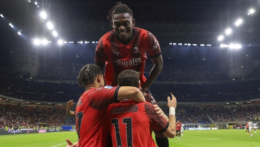 MILAN, ITALY - MAY 11: Christian Pulisic of AC Milan celebrates with Rafael Leao after scoring the his team's five goal during the Serie A TIM match between AC Milan and Cagliari at Stadio Giuseppe Meazza on May 11, 2024 in Milan, Italy. (Photo by Giuseppe Cottini/AC Milan via Getty Images)