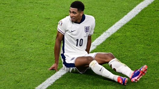 England's midfielder #10 Jude Bellingham reacts during the UEFA Euro 2024 final football match between Spain and England at the Olympiastadion in Berlin on July 14, 2024. (Photo by Tobias SCHWARZ / AFP)