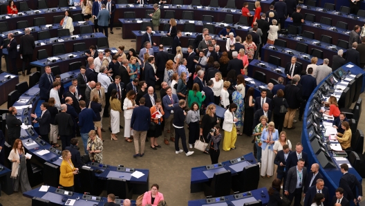 STRASBOURG, FRANCE - JULY 18: Deputies of the European Parliament queue to cast their ballot on July 18, 2024 in Strasbourg, France. Members of the European Parliament decide today on a second term for Ursula von der Leyen as the head of the European Commission, a role she has held since December 1, 2019. To be re-elected, she needs the support of at least 361 MEPs in the 720-seat European Parliament. Additionally, the leadership positions for the European Parliament, European Council, and the EU's foreign affairs are also being decided. On Tuesday, the newly-elected EU Parliament began its first legislative term in France following the recent elections. (Photo by Johannes Simon/Getty Images)