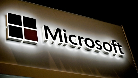 (FILES) This picture shows the Microsoft logo at the International Cybersecurity Forum (FIC) in Lille on January 28, 2020. A major outage wrought havoc on global computer systems on July 19, 2024, grounding flights in the United States, derailing television broadcasts in the UK and impacting telecommunications in Australia. (Photo by DENIS CHARLET / AFP)