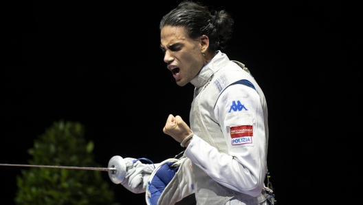 epa11420889 Tommaso Marini celebrates after winning the gold medal bout of the Foil Men's Senior Individual competition of the Fencing Euro 2024 in Basel, Switzerland, 18 June 2024.  EPA/GEORGIOS KEFALAS