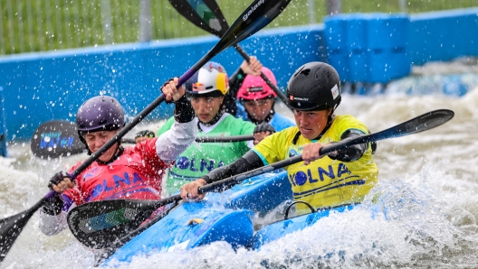 Jessica Fox of Australia, Teresa Kneblowa of Czech Republic, Kimberley Woods of Great Britain, Katerina Bekova of Czech Republic, compete in Women Kayak Cross Finals of ICF Canoe Slalom World Cup Krakow 2024 on Kolna Sport Centre course on June 16, 2024 in Krakow. Poland. (Photo by Dominika Zarzycka/NurPhoto) (Photo by Dominika Zarzycka / NurPhoto / NurPhoto via AFP)