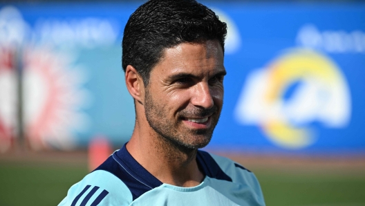 Arsenal Manager Mikel Arteta speaks with the press during the Football Meets Football Youth Clinic at the LA Rams NFL training camp on the Loyola Marymount University (LMU) campus on July 26, 2024 in Los Angeles, California. Arsenal FC will play Manchester United FC in an exhibition match at SoFi Stadium on Saturday as part of the Rivals in Red USA 2024 Tour. (Photo by Patrick T. Fallon / AFP)