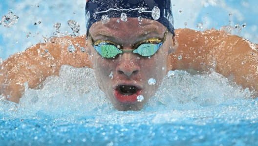 France's Leon Marchand competes in  a semifinal of the men's 200m individual medley swimming event during the Paris 2024 Olympic Games at the Paris La Defense Arena in Nanterre, west of Paris, on August 1, 2024. (Photo by Oli SCARFF / AFP)