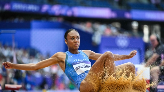 Italy's Larissa Iapichino competes in the women's long jump qualification of the athletics event at the Paris 2024 Olympic Games at Stade de France in Saint-Denis, north of Paris, on August 6, 2024. (Photo by Andrej ISAKOVIC / AFP)