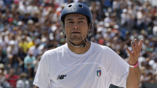 Italy's Alex Sorgente reacts after competing in the men's park skateboarding prelims during the Paris 2024 Olympic Games at La Concorde in Paris on August 7, 2024. (Photo by Odd ANDERSEN / AFP)