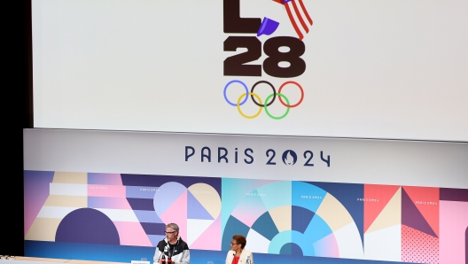 PARIS, FRANCE - AUGUST 10: A general view as the LED screen, depicting the LA28 Olympics logo, is seen whilst Casey Wasserman, LA28 Chairperson and President, and Karen Bass, Mayor of Los Angeles, speak at the LA28 Press Conference on day fifteen of the Olympic Games Paris 2024 at the Main Press Centre on August 10, 2024 in Paris, France. (Photo by Luke Hales/Getty Images)