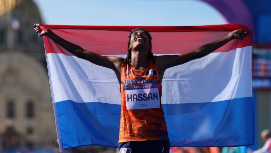 PARIS, FRANCE - AUGUST 11: Sifan Hassan of Team Netherlands celebrates after winning the Women's Marathon on day sixteen of the Olympic Games Paris 2024 at Esplanade Des Invalides on August 11, 2024 in Paris, France. (Photo by Cameron Spencer/Getty Images)