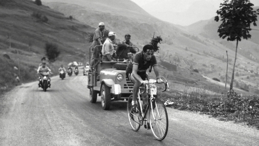 Italian cyclist Fausto Coppi makes his effort in the climb of Alpe d'Huez on July 4, 1952, during the 10th stage, Lausanne-Alpe d'Huez, of the Tour de France 1952. Coppi wins the stage in front of the French Jean Robic. (Photo by AFP)