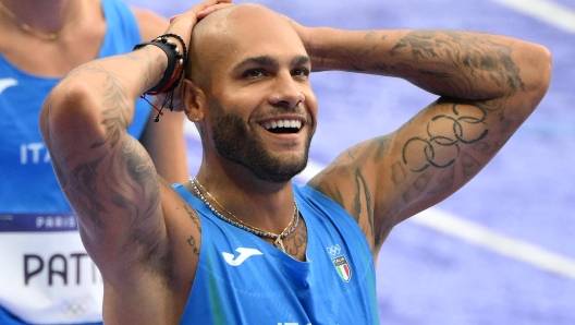 Italy's Lamont Marcell Jacobs reacts after the Men's 4x100m Relay final of the Athletics competitions in the Paris 2024 Olympic Games, at the Stade de France stadium in Saint Denis, France, 9 August 2024. ANSA/ETTORE FERRARI