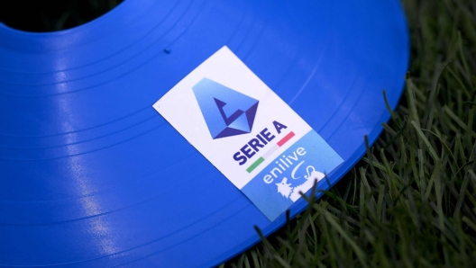 The logo of the new sponsor of Lega Serie A "Eni live" is pictured during the Italian Serie A football match between Genoa and Inter Milan at the Luigi Ferraris Stadium in Genoa, on August 17, 2024. (Photo by MARCO BERTORELLO / AFP)