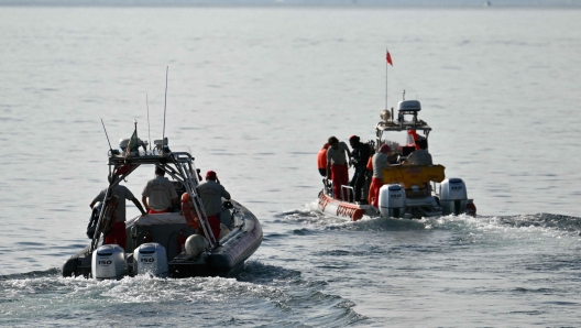 Divers of the Vigili del Fuoco, the Italian Corps. of Firefighters leave Porticello harbor near Palermo, to resume research for a last missing person on August 23, 2024, four days after the British-flagged luxury yacht Bayesian sank. The body of UK tech tycoon Mike Lynch was recovered on August 22, 2024 from his sunken yacht off Sicily, as the search continued for the last of the six people missing. The Bayesian, which had 22 people aboard including 10 crew, was anchored some 700 metres from port before dawn when it was struck by a waterspout. Among the six missing were UK tech entrepreneur Mike Lynch and his 18-year-old daughter Hannah, and Jonathan Bloomer, the chair of Morgan Stanley International, and his wife Judy. (Photo by Alberto PIZZOLI / AFP)