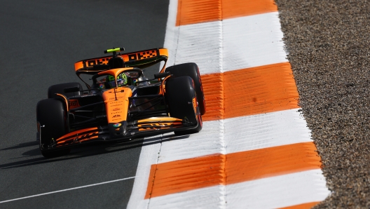 ZANDVOORT, NETHERLANDS - AUGUST 23: Lando Norris of Great Britain driving the (4) McLaren MCL38 Mercedes on track  during practice ahead of the F1 Grand Prix of Netherlands at Circuit Zandvoort on August 23, 2024 in Zandvoort, Netherlands. (Photo by Clive Rose/Getty Images)