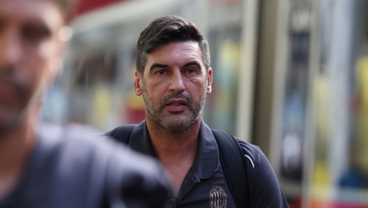 MILAN, ITALY - AUGUST 23: Head coach AC Milan Paulo Fonseca leaves by train from Milan for Parma station at Stazione Centrale on August 23, 2024 in Milan, Italy. (Photo by Claudio Villa/AC Milan via Getty Images)