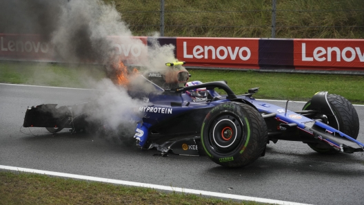 Williams driver Logan Sargeant of the US sits in his car after a crash during the third free practice ahead of the Formula One Dutch Grand Prix race at the Zandvoort racetrack, Netherlands, Saturday, Aug. 24, 2024. (AP Photo/Peter Dejong)